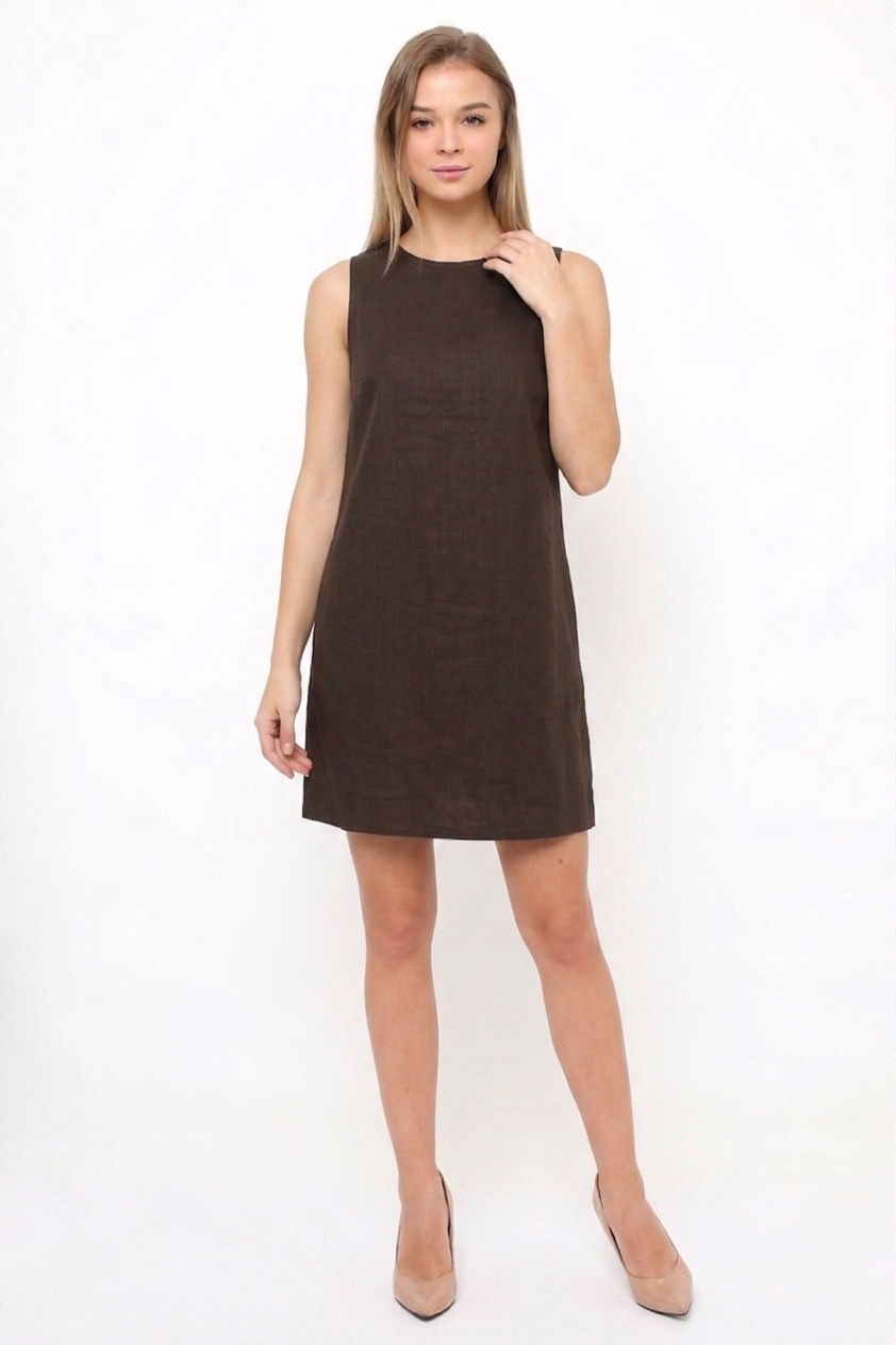 Model wearing a brown linen sleeveless shift dress